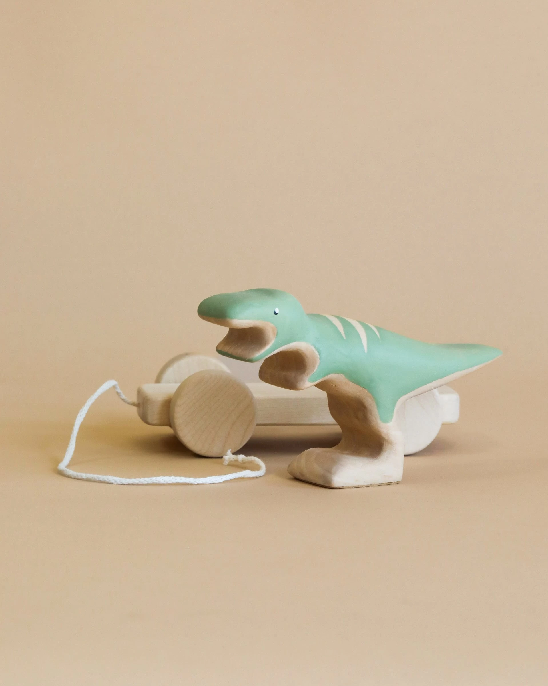 Handmade Wooden T-Rex Dinosaur Push Toy With Built-In Magnets 1 Handmade Wooden T-Rex Dinosaur Push Toy With Built-In Magnets