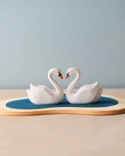 Handmade Wooden Swans In A Lake